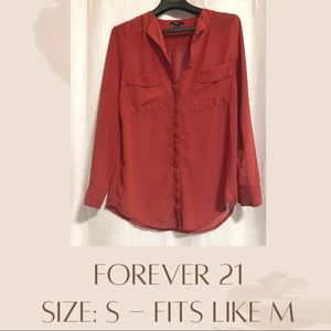 Red maroon long sleeve top. It’s seethrough so wear under shirt. Business casual